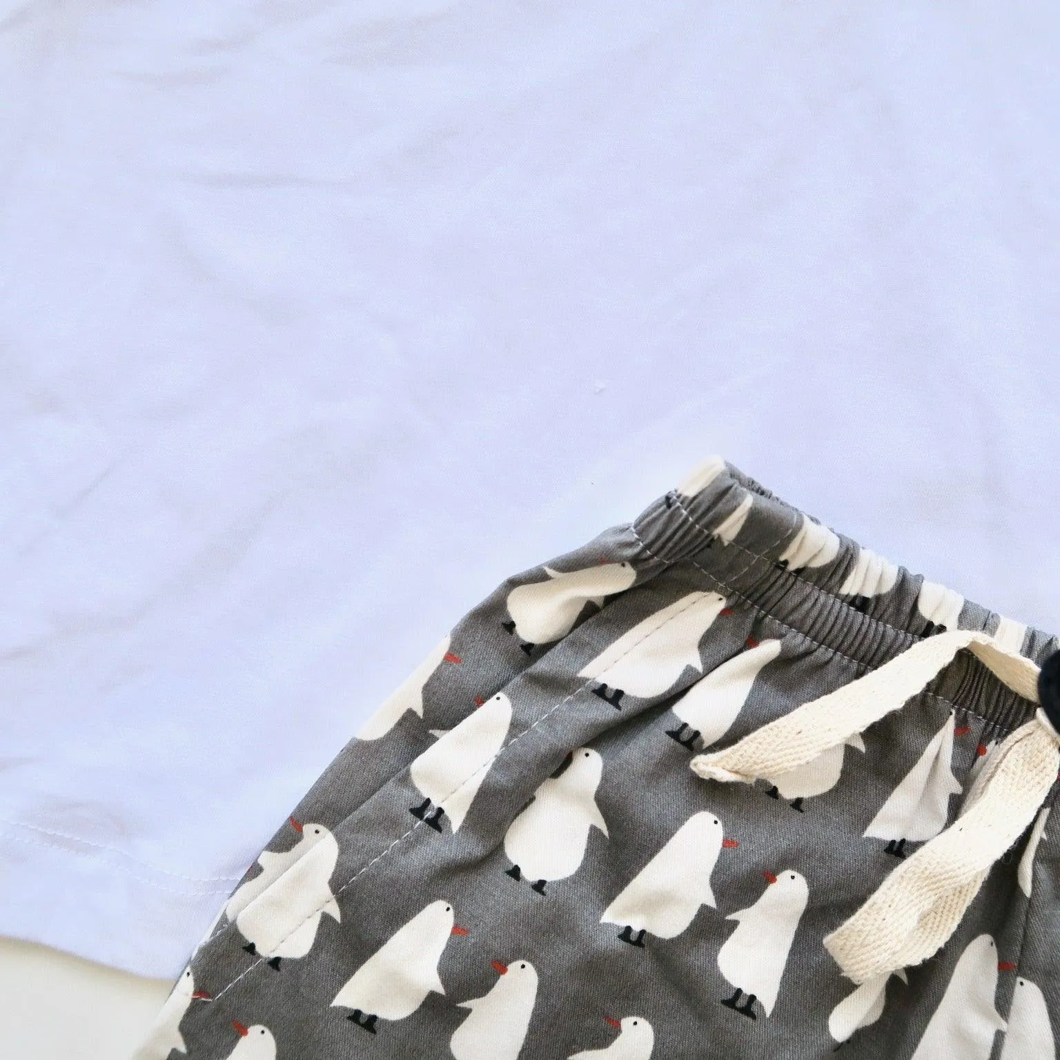 Caper Top & Shorts in Penguin Gray Print and White Stretch