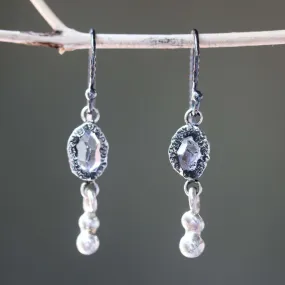 Earrings Clear quartz crystal in silver bezel setting with silver peanut on sterling silver hooks style