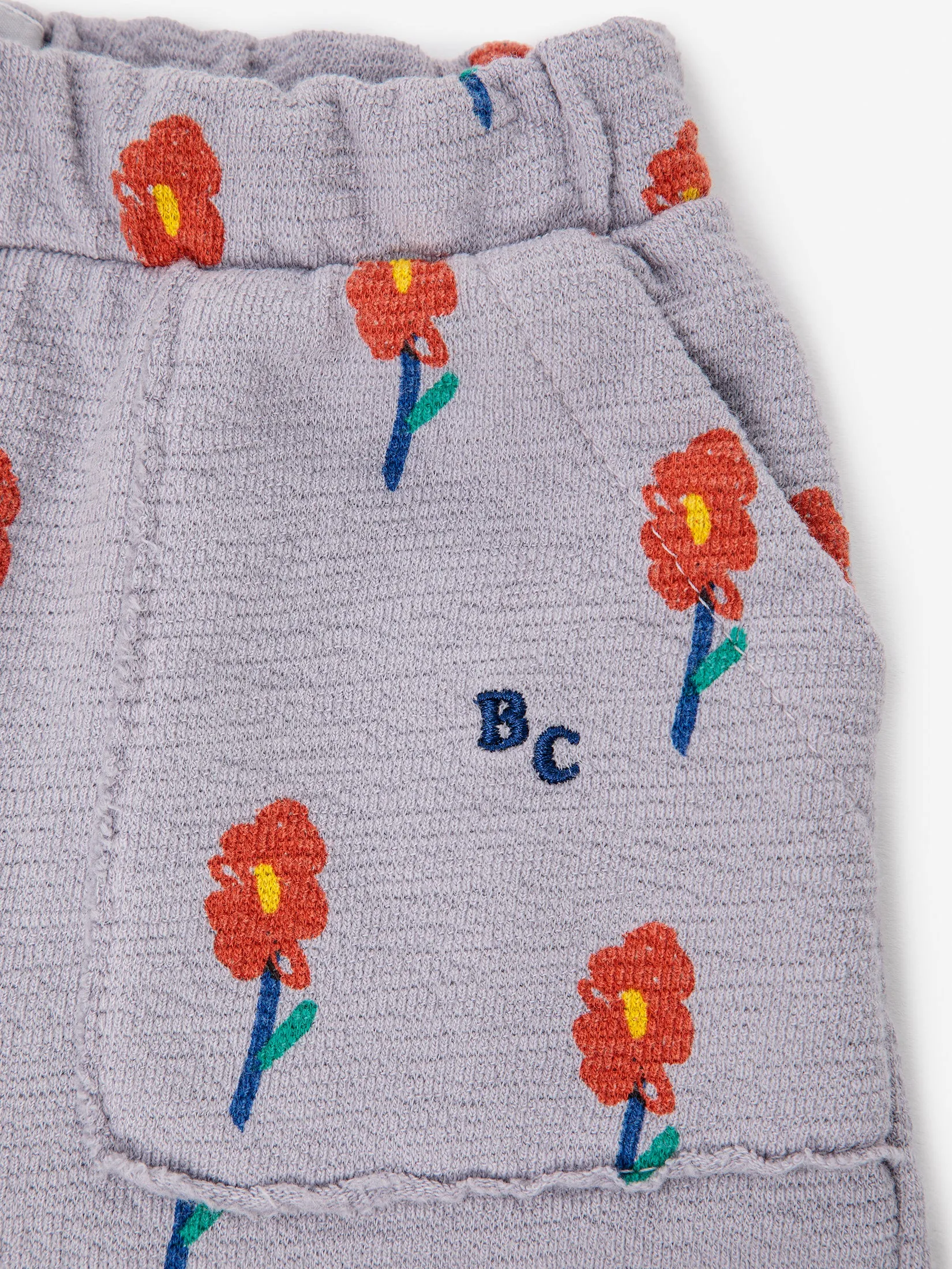 FLOWERS ALL OVER JOGGING PANTS