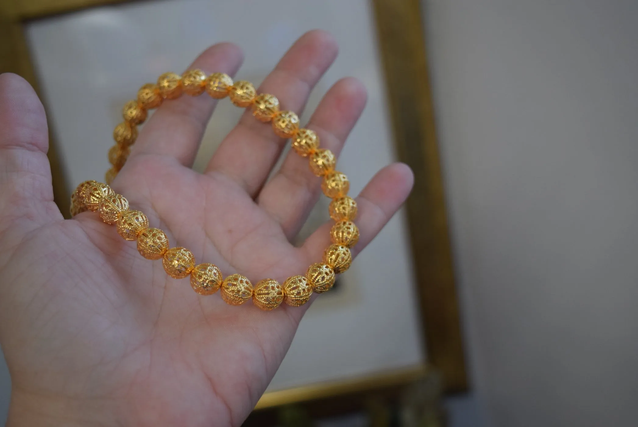 Golden Filigree Bead Necklace